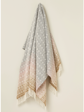 British Wool throw in an Ombre Diamond design in a Pink and Grey Colour. From Bronte by Moon. 
